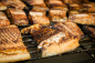 Preview: Vihiluodon Kala Loimu Flammlachs, beim Räuchern auf dem Rost